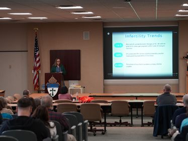 Katie McMahon, co-founder of Shiloh IVF Ministry, speaks at the Conference