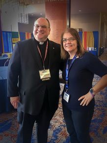 Sue Berdis and Father Frank S Donio