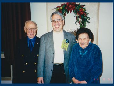 Dale DeMarco with his parents, John and Rose