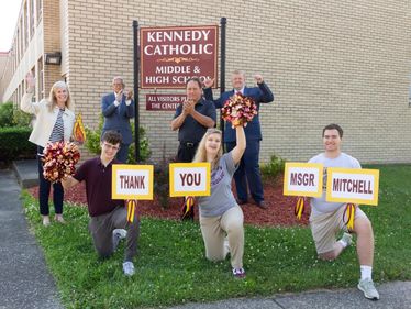 Lisa Louis joins Kennedy Catholic students and administrators to celebrate Msgr. Mitchell's bequest. Photo credit Natalie Stanton Photography