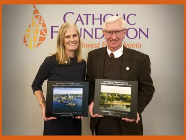 Lisa Louis and Bob Crowley honored for their work for the Catholic Foundation.