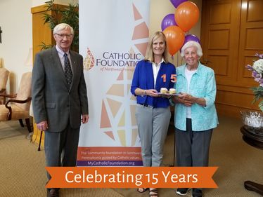 Bob Crowley, Foundation Board Chair, Lisa Louis, Executive Director, and Sr. Catherine Manning SSJ, celebrate the Catholic Foundation's anniversary.